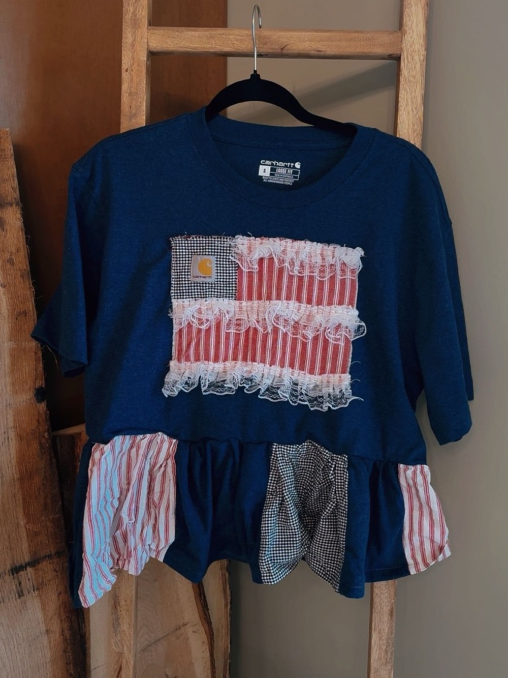Carhartt Navy Blue Graphic Frayed Peplum Tee with Red & White Patch